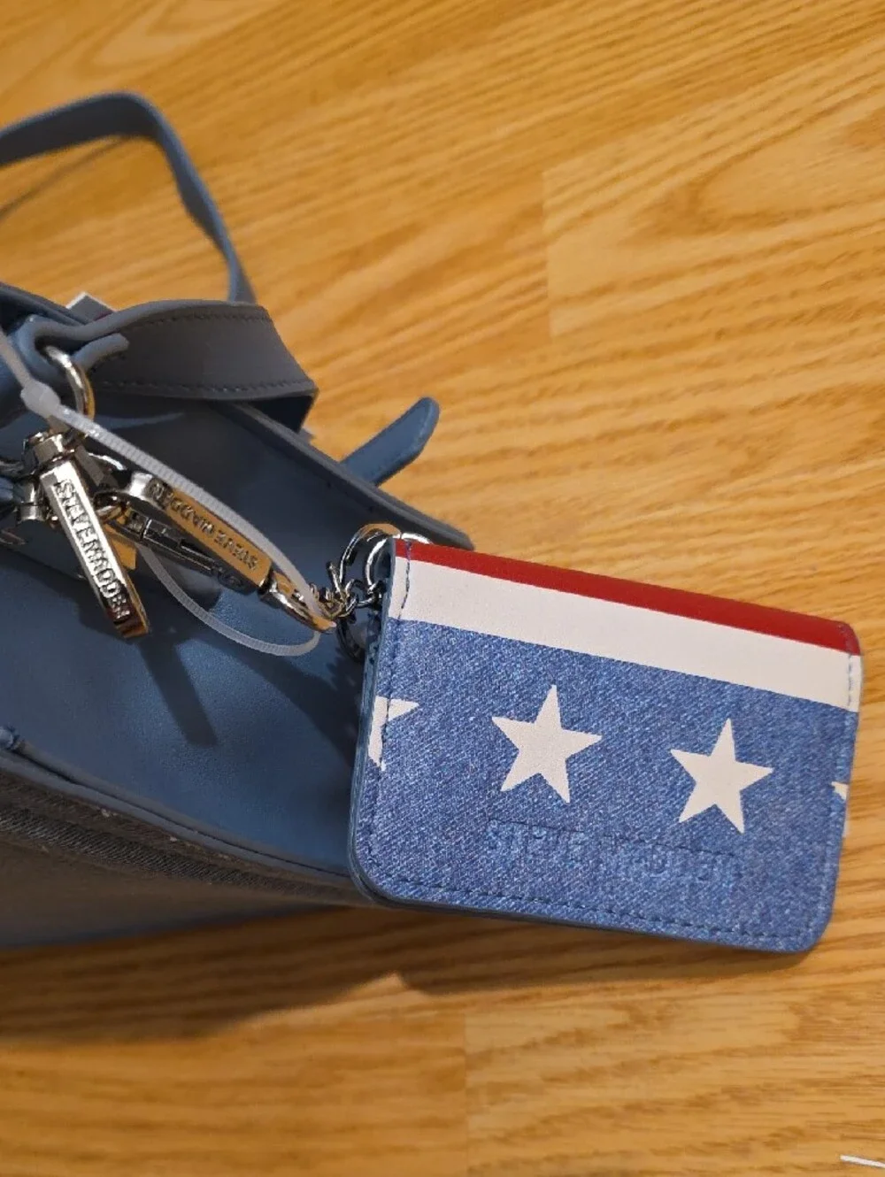 Steve Madden Light Blue Bevlynn Denim Stachel with Patriotic Wallet Charm